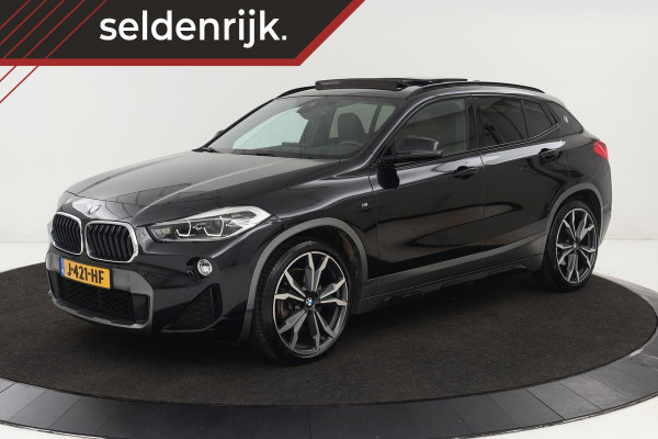 BMW X2 xDrive20i High Executive | M Sport X | Panoramadak | Leder | Harman/Kardon | Stoelverwarming | Camera | Head-Up | Carplay | DAB | Trekhaak | Keyless | Navigatie | Full LED