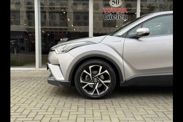 Toyota C-HR 1.8 Hybrid Style | Dodehoekherkenning, Parkeersensoren, Navigatie, Stoel + Stuurverwarming, Keyless, 18 inch