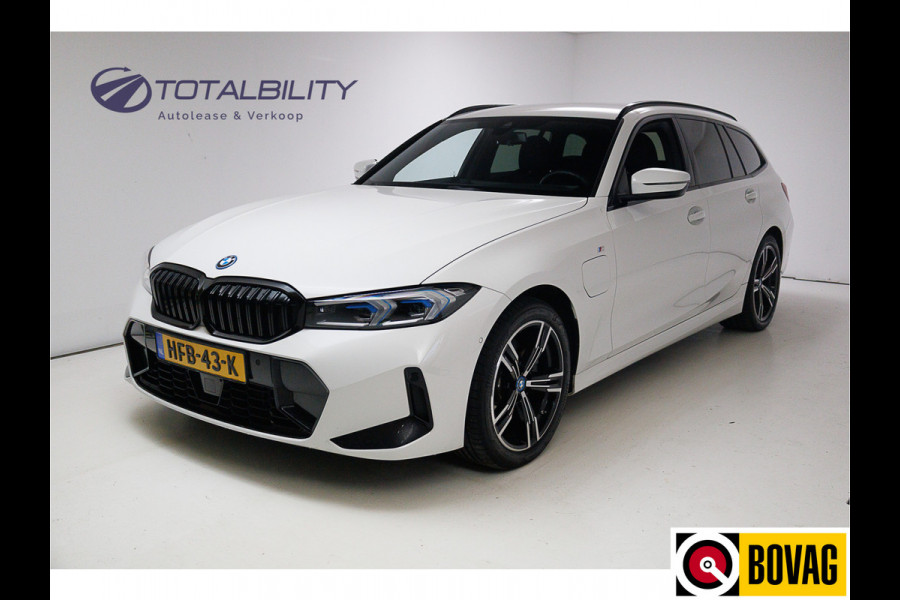 BMW 3 Serie Touring 330e Touring M-sport LCI 292 PK | Camera | Adap. Cruise | Active guard plus Led, Navi, App. connect, Elec. klep, Stoel- en Stuurverwarming, nw. model!