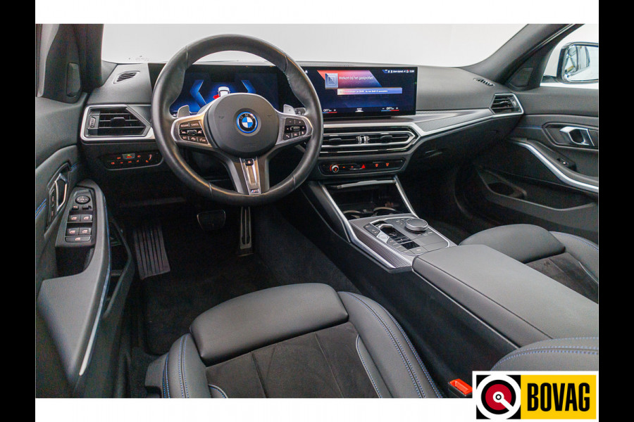 BMW 3 Serie Touring 330e Touring M-sport LCI 292 PK | Camera | Adap. Cruise | Active guard plus Led, Navi, App. connect, Elec. klep, Stoel- en Stuurverwarming, nw. model!