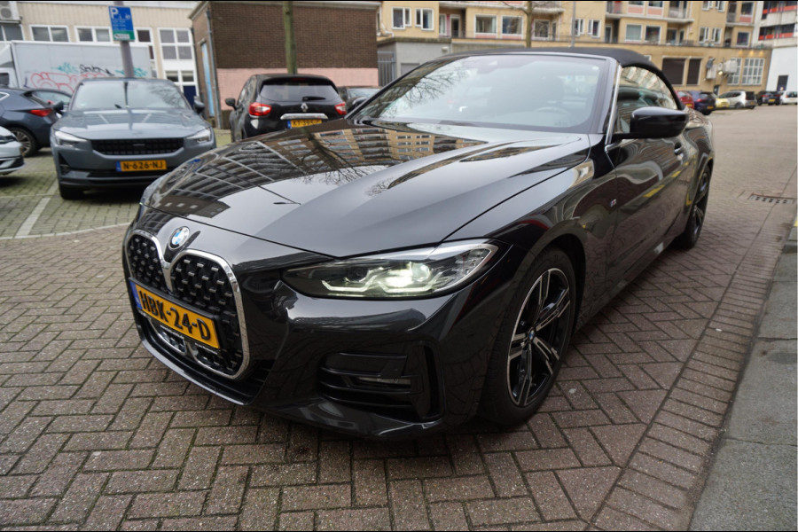 BMW 4 Serie Cabrio 420i High Executive 3x M-SPORT (Exterieur/ Interieur/ Onderstel) | BMW Garantie 12/2026 | Black on Black | Nieuwstaat | Keyless | Led | Apple | Memory | Virtual Cockpit | Sfeerverlichting