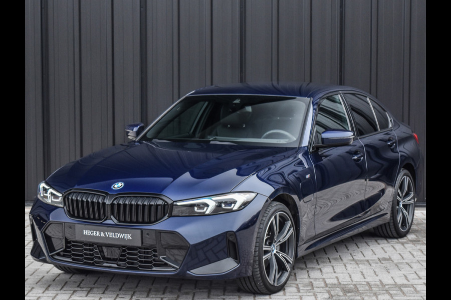 BMW 3-serie 330e xDRIVE | M-SPORT | TREKHAAK | SPORTSTOELEN | ACTIVE CRUISE CONTROL | CAMERA | LEDEREN BEKLEDING | DAB+ | HIFI SOUND | SHADO