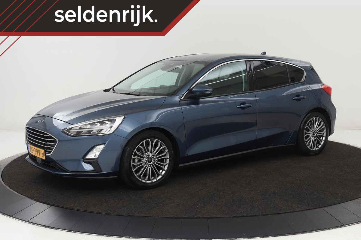 Ford Focus 1.0 EcoBoost Titanium | 1e eigenaar | Stoel & stuurverwarming | Adaptive cruise | Trekhaak | Camera | Carplay | Keyless