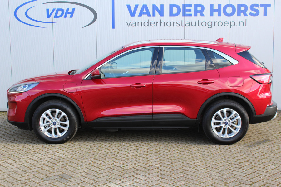 Ford Kuga 2.5-225pk PHEV Titanium X Plug-In-Hybrid. Fabrieksgarantie t/m 04-01-2028 ! Slechts 4.900km ! Elektr. trekhaak / achterklep, stoel-, stuur- en voorraamverw., volautm. airco, navigatie, telefoonvoorb., LM wielen, metallic lak, AGR comfortst., head-up-display, LED verl. etc.