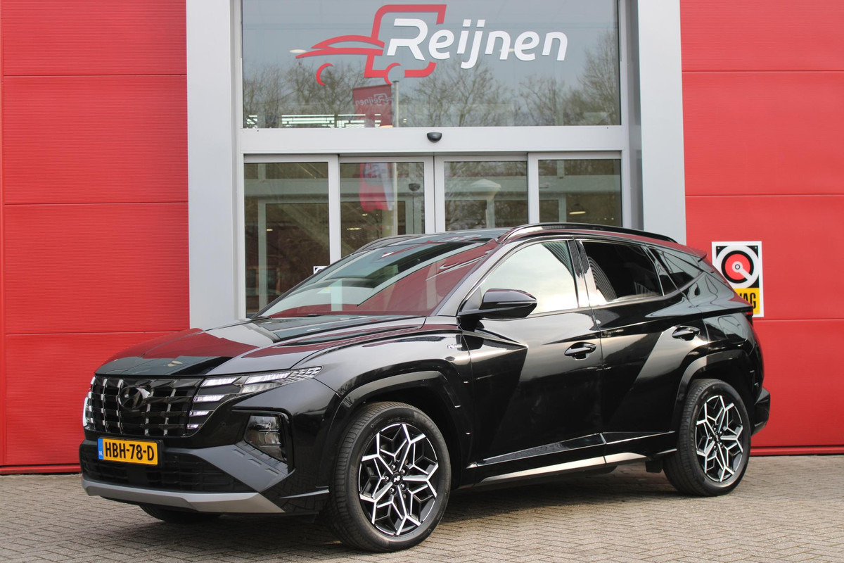 Hyundai Tucson 1.6 T-GDI 266PK PHEV N LINE 4WD | NAVIGATIE | APPLE CARPLAY/ANDROID AUTO | ADAPTIVE CRUISE CONTROL | DODEHOEK DETECTIE | STOEL/STUUR VERWARMING | CLIMATE CONTROL | FULL LED KOPLAMPEN | ACHTERUITRIJ CAMERA | ELEKTRISCH BEDIENBARE ACHTERKLEP | STUUR VERWARMING | KEYLESS ENTRY/START | 19" LICHTMETALEN VELGEN | DODEHOEK DETECTIE | PANORAMISCH SCHUIF/KANTEL DAK |