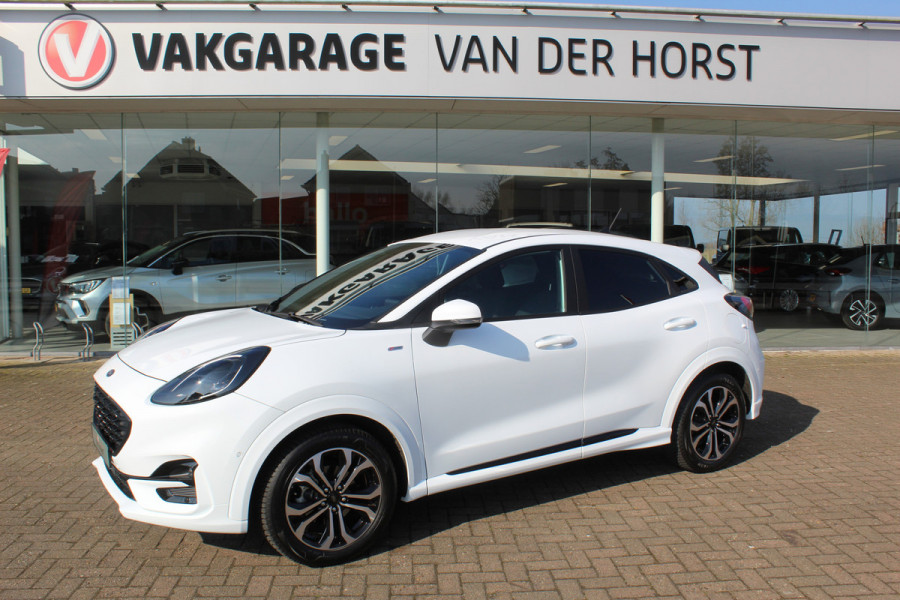 Ford Puma 1.0-125 pk EcoBoost Mild-Hybrid ST-Line. Fabrieksgarantie t/m 18-03-2028 ! Slechts 14.000km ! Autm. airco, stoel-, stuur- en voorraamverw., elektr. achterklep, LM wielen, camera, all season banden, keyless entry/start, LED verl. parkeersensor v+a, navigatie, telefoonvoorb. etc