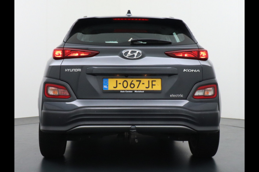 Hyundai Kona EV Comfort 64kWh 204PK Trekhaak Adap.Cruise Warmtepomp Android Auto Apple Carplay Navi Ecc DAB Camera Led Keyless Highway assist sys. Rijstrooksensor met correctie Voorruit verwarmbaar 1e Eigenaar