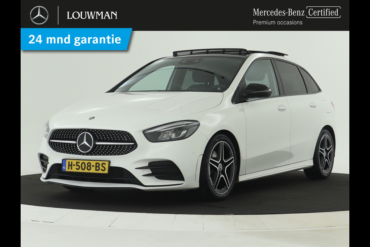 Mercedes-Benz B-Klasse 180 Business Solution AMG | 5 spaaks lichtmetalen velgen | Panoramadak | MBUX wide screen | Navigatie | Parking support | Inclusief 24 maanden MB Certified garantie voor Europa.