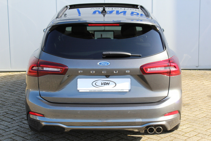 Ford FOCUS Wagon 1.0-125pk EcoBoost ST-Line X. Geweldig mooie, luxe en sportieve Focus wagon ! Slechts 12.000km ! Autm. airco, stoel-, stuur- en voorraamverw., ergonomische stoelen, adaptieve cruise cntrl, side- en lane assist, elektr. panodak, B&O soundsyst., etc.