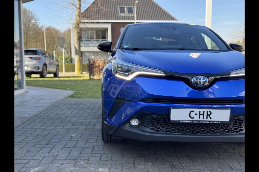 Toyota C-HR 1.8 Hybrid Bi-Tone Plus | JBL, LED, Half Leer/Alcantara, Navigatie, Dodehoekherkenning, Parkeersensoren, Chroom Pakket, Zeer com