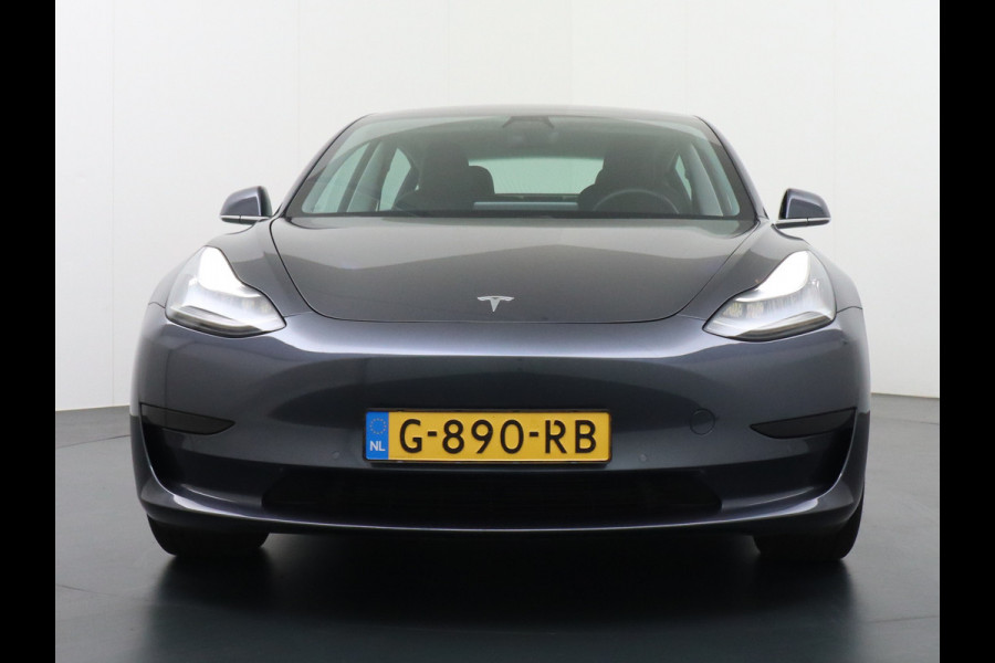 Tesla Model 3 SR+60kWh 325PK 18" AutoPilot FSD-computer 3 Premium Luidsprekers  Leer PanoDak Adaptive cruise Camera's Elektr.-Stuur+Stoelen+Sp Ecc Navigatiesysteem full map LED-a+v Comfortstoelen ACC Dual-ECC DAB Voorverwarmen interieur via App Keyless via Telefoonsleutel One-Pedal-Drive Orig. nlse auto tot 11kw laden thuis! Garantie Accu tot  05-11-2027 max 160.000km 1.584kg licht!