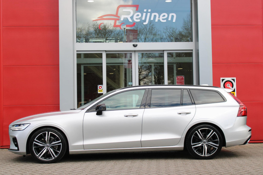 Volvo V60 2.0 T4 R-DESIGN 190PK AUTOMAAT | ZEER LAGE KILOMETERSTAND | 19" 5 TRIPPLE SPAAKS BLACK / DIAMOND CUT LICHTMETALEN VELGEN | ELEKTRISCH WEGKLAPBARE TREKHAAK | 1800KG TREKGEWICHT! | NAVIGATIE | APPLE CARPLAY/ANDROID AUTO | ACTIVE HIGH BEAM FULL LED KOPLAMPEN | ACHTERUITRIJ CAMERA | PARKEERSENSOREN VOOR EN ACHTER | LEDEREN BEKLEDING | STOEL VERWARMING | ELEKTRISCH BEDIENBARE VOORSTOELEN MET GEHEUGENFUNCTIE | ELEKTRISCH BEDIENBARE ACHTERKLEP | ADAPTIVE CRUISE CONTROL |