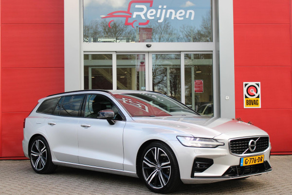 Volvo V60 2.0 T4 R-DESIGN 190PK AUTOMAAT | ZEER LAGE KILOMETERSTAND | 19" 5 TRIPPLE SPAAKS BLACK / DIAMOND CUT LICHTMETALEN VELGEN | ELEKTRISCH WEGKLAPBARE TREKHAAK | 1800KG TREKGEWICHT! | NAVIGATIE | APPLE CARPLAY/ANDROID AUTO | ACTIVE HIGH BEAM FULL LED KOPLAMPEN | ACHTERUITRIJ CAMERA | PARKEERSENSOREN VOOR EN ACHTER | LEDEREN BEKLEDING | STOEL VERWARMING | ELEKTRISCH BEDIENBARE VOORSTOELEN MET GEHEUGENFUNCTIE | ELEKTRISCH BEDIENBARE ACHTERKLEP | ADAPTIVE CRUISE CONTROL |