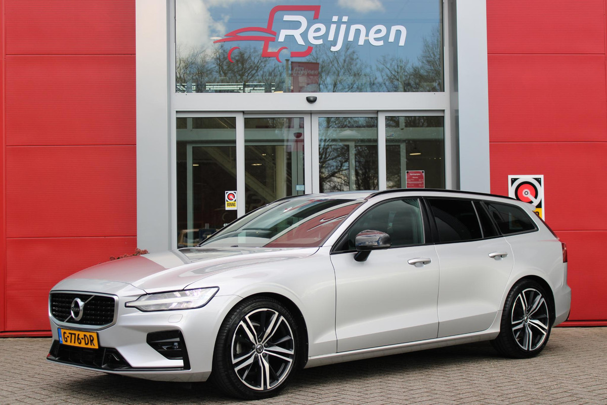 Volvo V60 2.0 T4 R-DESIGN 190PK AUTOMAAT | ZEER LAGE KILOMETERSTAND | 19" 5 TRIPPLE SPAAKS BLACK / DIAMOND CUT LICHTMETALEN VELGEN | ELEKTRISCH WEGKLAPBARE TREKHAAK | 1800KG TREKGEWICHT! | NAVIGATIE | APPLE CARPLAY/ANDROID AUTO | ACTIVE HIGH BEAM FULL LED KOPLAMPEN | ACHTERUITRIJ CAMERA | PARKEERSENSOREN VOOR EN ACHTER | LEDEREN BEKLEDING | STOEL VERWARMING | ELEKTRISCH BEDIENBARE VOORSTOELEN MET GEHEUGENFUNCTIE | ELEKTRISCH BEDIENBARE ACHTERKLEP | ADAPTIVE CRUISE CONTROL |