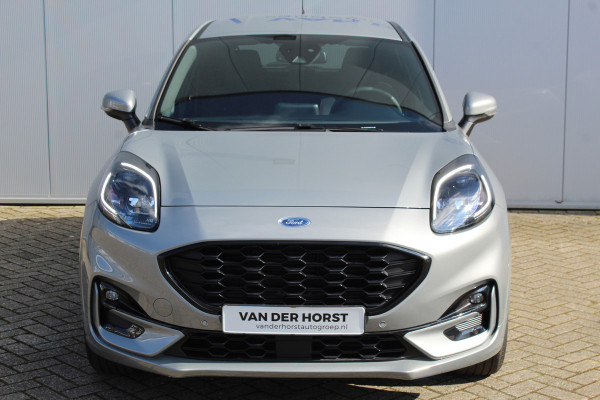 Ford Puma 1.0-125pk EcoBoost Hybrid ST-Line. April 2024 ! Slechts 6.500km ! Autm. airco, navigatie, telefoonvoorb., camera, pdc v+a, parkeerassistent, LED verl., metallic lak, LM wielen, stoel-, stuur- en voorraamverw., lane- en sideassist, adapt. cruise cntrl etc