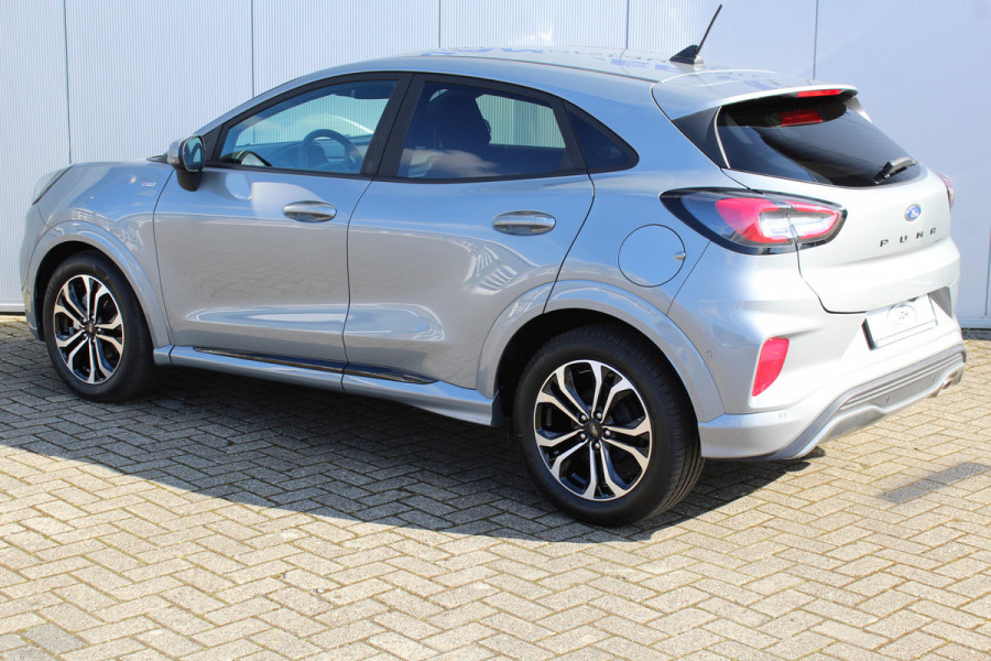 Ford Puma 1.0-125pk EcoBoost Hybrid ST-Line. April 2024 ! Slechts 6.500km ! Autm. airco, navigatie, telefoonvoorb., camera, pdc v+a, parkeerassistent, LED verl., metallic lak, LM wielen, stoel-, stuur- en voorraamverw., lane- en sideassist, adapt. cruise cntrl etc