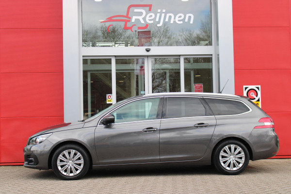 Peugeot 308 SW 1.2 130PK ALLURE | TREKHAAK | PANORAMA DAK | NAVIGATIE | APPLE CARPLAY/ANDROID AUTO | CLIAMTE CONTROL | ADAPTIVE CRUISE CONTROL | PARKEERSENSOREN VOOR EN ACHTER | LICHTMETALEN VELGEN | DAB+ RADIO | ALL SEASON BANDEN |