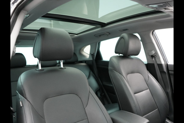 Hyundai Tucson 1.6 T-GDI Premium Automaat | Panodak | Lederen Sportstoelen | Trekhaak Afneembaar | Apple Carplay | Navigatie | Cruise Control | Navigatie | Camera | L.M. 19" |