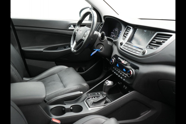 Hyundai Tucson 1.6 T-GDI Premium Automaat | Panodak | Lederen Sportstoelen | Trekhaak Afneembaar | Apple Carplay | Navigatie | Cruise Control | Navigatie | Camera | L.M. 19" |