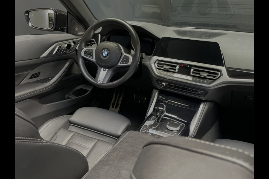 BMW 4 Serie Cabrio M440I laser/acc/head-up/dravitgrau/harmankardon/trekhaak