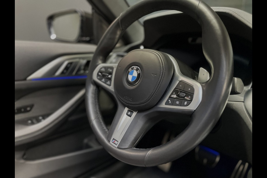 BMW 4 Serie Cabrio M440I laser/acc/head-up/dravitgrau/harmankardon/trekhaak