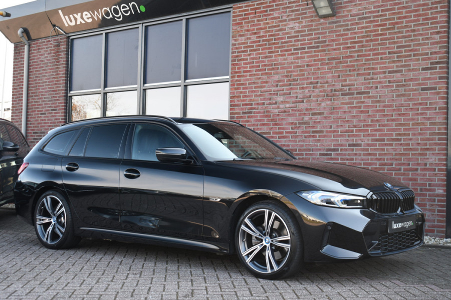 BMW 3 Serie Touring 330e M-Sport el-trekh el-zetels HUD 19inch camera HiFi