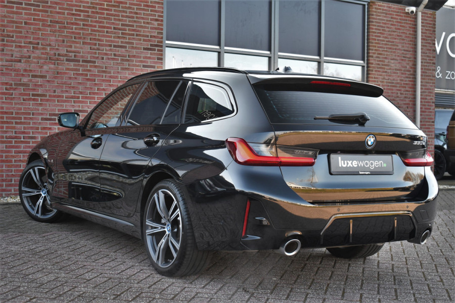 BMW 3 Serie Touring 330e M-Sport el-trekh el-zetels HUD 19inch camera HiFi