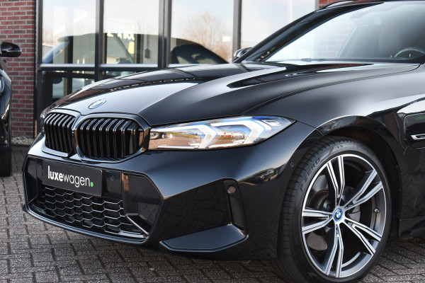 BMW 3 Serie Touring 330e M-Sport el-trekh el-zetels HUD 19inch camera HiFi