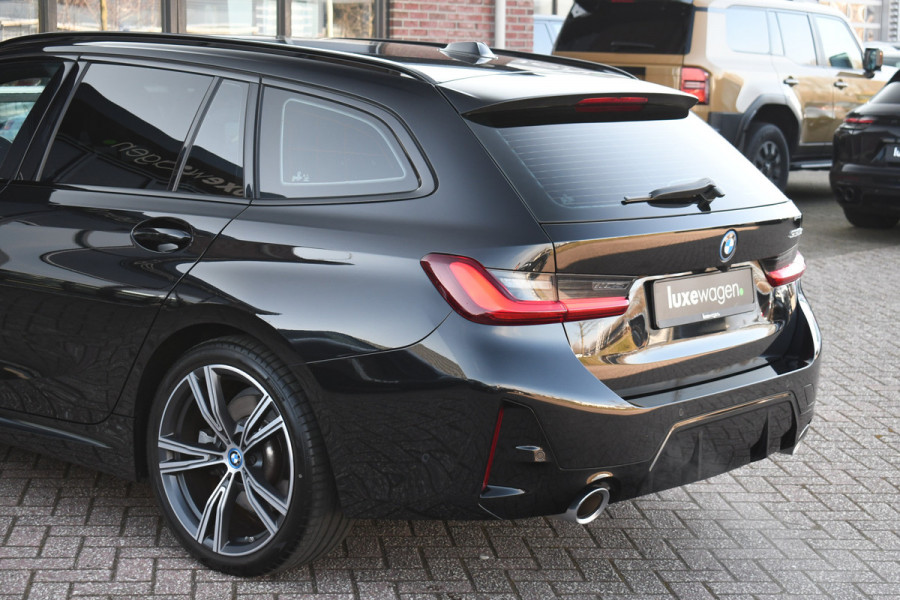 BMW 3 Serie Touring 330e M-Sport el-trekh el-zetels HUD 19inch camera HiFi