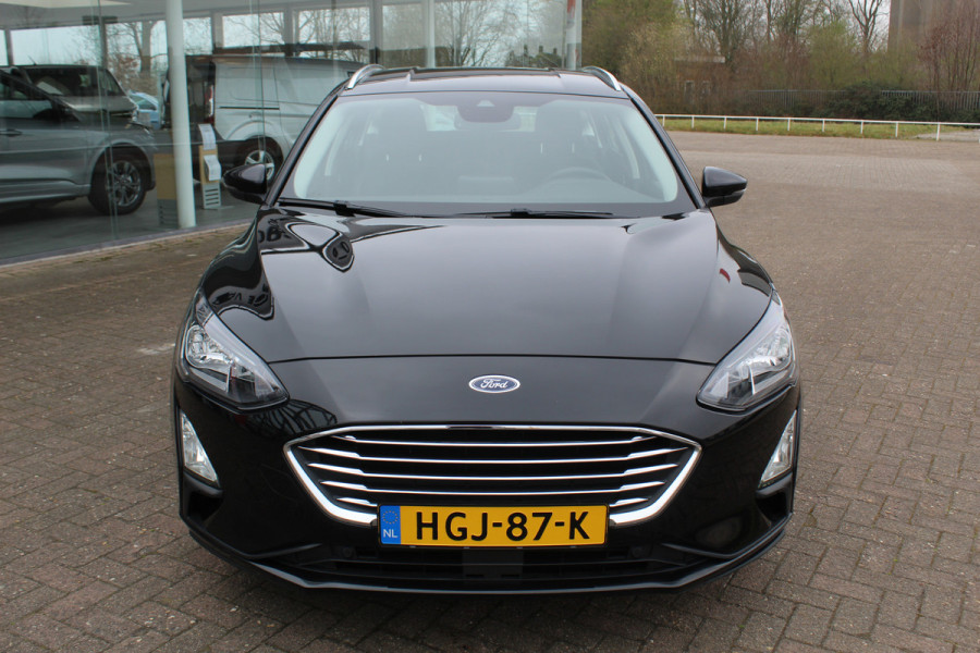 Ford FOCUS Wagon 1.0-125pk EcoBoost Mild-hybrid Titanium. Mooie, ruime, luxe en comfortabele Ford Focus wagon ! Volautm. airco dual, camera, stoel-, stuur- en voorraamverw., easy entry/easy go, cruise control, Isofix, side- en lane assist, parkeersensoren v+a, LM wielen etc.