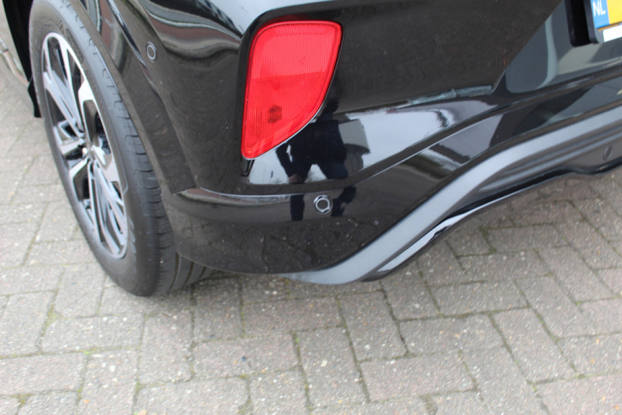 Ford Puma 1.0-125pk EcoBoost Hybrid ST-Line. April 2024 ! Slechts 8.400km ! Autm. airco, navigatie, telefoonvoorb., camera, pdc v+a, parkeerassistent, LED verl., metallic lak, LM wielen, stoel-, stuur- en voorraamverw., lane- en sideassist, adapt. cruise cntrl etc