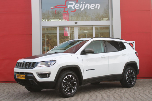 Jeep Compass 4xe 240PK PHEV TRAILHAWK AUTOMAAT | NAVIGATIE | ACHTERUIRIJCAMERA | APPLE CARPLAY / ANDROID AUTO | DIGITALE COCKPIT | XENON KOPLAMPEN | 17" OFF-ROAD LICHTMETALEN VELGEN | ALL SEASON BANDEN | CRUISE CONTROL | 4 WIELAANDRIJVING | PARKEERSENSOREN VOOR / ACHTER |