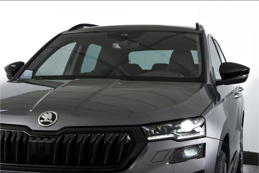 Škoda Karoq 1.5 TSI ACT 150 PK Sportline Business - Automaat | Dig. Cockpit | Adapt. Cruise | Stoel-Stuurverw. | PDC | Camera | NAV + App. Connect | ECC | DAB | Elek. Klep | Afn. Trekhaak | LM 19" |