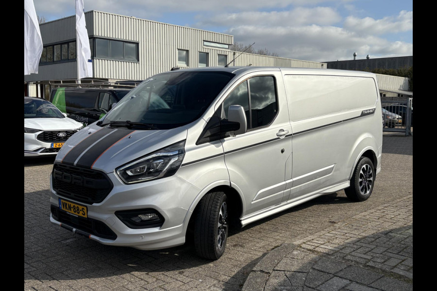 Ford Transit Custom 320 2.0 TDCI L2H1 Sport Zuid | Automaat 185pk | Camera | Bi-Xenon | Trekhaak | Stoelverwarming | Betimmering + Vloer | Raptor Grille