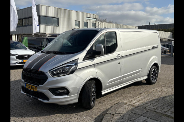 Ford Transit Custom 320 2.0 TDCI L2H1 Sport Zuid | Automaat 185pk | Camera | Bi-Xenon | Trekhaak | Stoelverwarming | Betimmering + Vloer | Raptor Grille