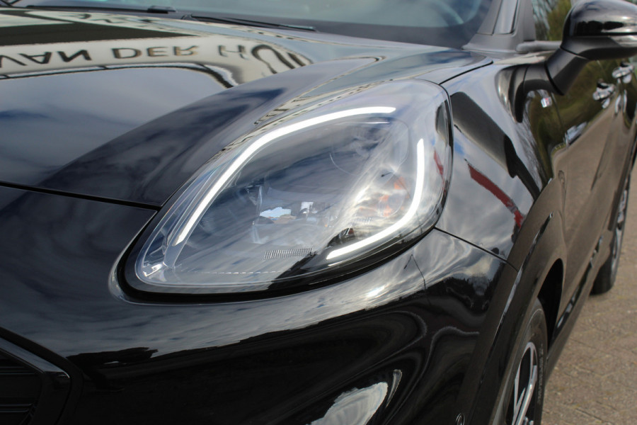 Ford Puma 1.0-125pk EcoBoost Hybrid ST-Line. April 2024 ! Slechts 7.400km ! Autm. airco, navigatie, telefoonvoorb., camera, pdc v+a, parkeerassistent, LED verl., metallic lak, LM wielen, stoel-, stuur- en voorraamverw., lane- en sideassist, adapt. cruise cntrl etc