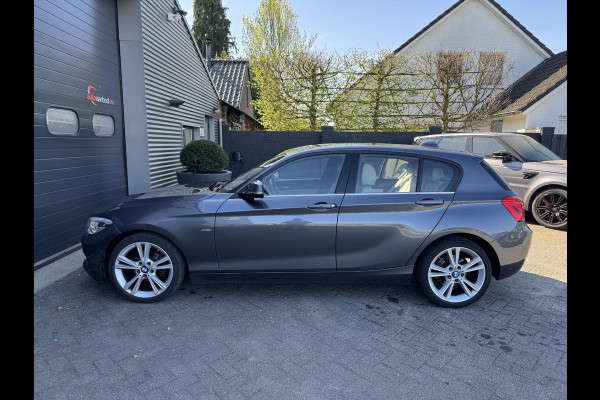 BMW 1-serie 118i Corporate Lease High Executive | Navigatie | Lederen Bekleding | Lichtmetalen Velgen | Parkeersensoren |