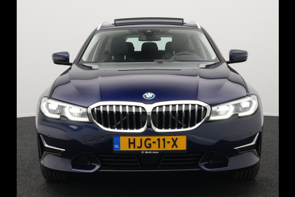 BMW 3 Serie Touring 330e Luxury Line Plug In Hybrid 293pk PHEV | Panodak | Laser LED | Adaptive Onderstel | 360 Camera | Adaptive cruise | Head Up | Lederen Sportstoelen Memory | Sfeerverlichting | 18"L.M | Keyless |