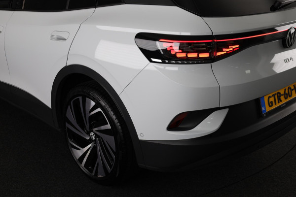 Volkswagen ID.4 Pro Business 77 kWh | 21"inch LM Velgen | Achteruitrijcamera | Led matrix | Navigatie | Elektrische Achterklep |