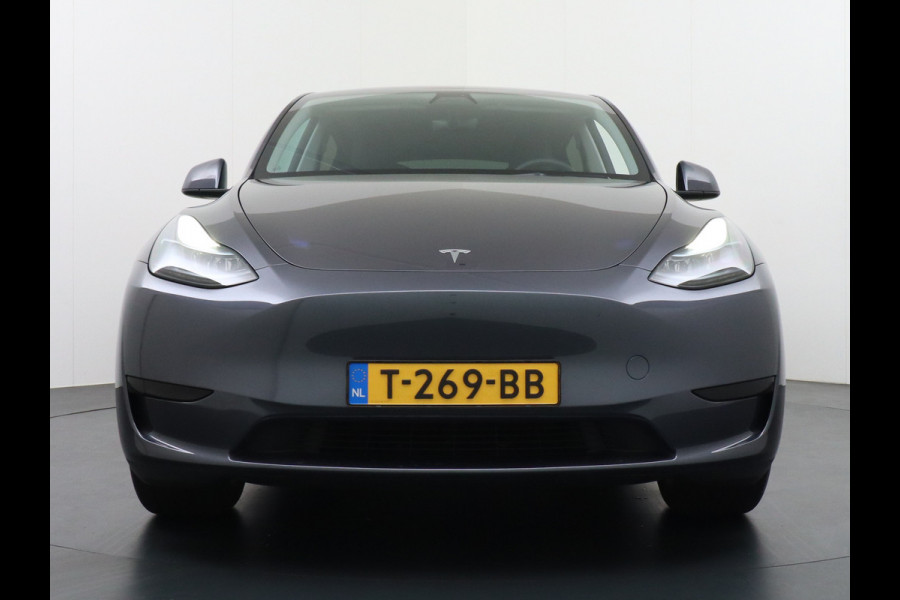 Tesla Model Y RWD 60kWh LFP 300PK Warmtepomp FSD-Computer 3 Auto-Pilot Sleutel-loos(via-GSM) Leder Premium Audio Camera's Panormadak Adap.Crui Elektr. Acht.klep WiFi Priv.Glass AEB ASR ESP IsoFix Connected-Services 1600kg Trekvermogen Orig.NLse Auto Accu-Garantie 6-2031/160.000km 1e Eigenaar 11kw thuis of snelladen tot 170kWh