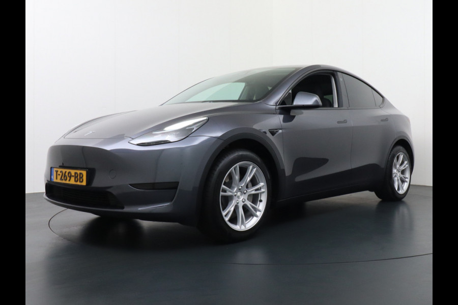 Tesla Model Y RWD 60kWh LFP 300PK Warmtepomp FSD-Computer 3 Auto-Pilot Sleutel-loos(via-GSM) Leder Premium Audio Camera's Panormadak Adap.Crui Elektr. Acht.klep WiFi Priv.Glass AEB ASR ESP IsoFix Connected-Services 1600kg Trekvermogen Orig.NLse Auto Accu-Garantie 6-2031/160.000km 1e Eigenaar 11kw thuis of snelladen tot 170kWh