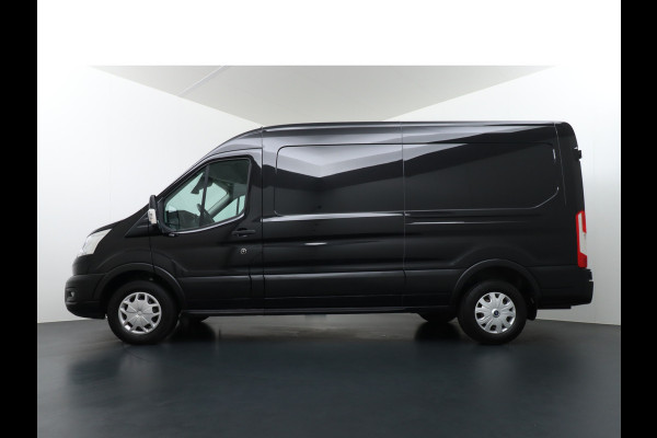 Ford Transit 350 2.0TDCI L3H2 3-Persoons Airco Trekhaak Cruise Control Voorruit verwarmbaar Pdc Licht/Regensensor Trend Bluetooth Betoplex vloer Lat om Lat Wand Betimmering 1e Eigenaar Euro 6 Trekgewicht 2.500KG