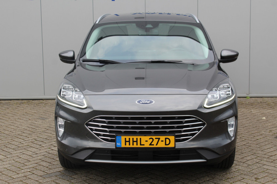 Ford Kuga 2.5-225pk PHEV Titanium X Plug-In Hybrid. Fabr. garantie t/m 07-04-2028 ! Slechts 10.000km ! Autm. airco dual, stoel-, stuur- en voorraamverw., LED verl., B&O soundsyst., metallic lak, cruise control, camera, LM wielen, elektr. achterklep en best. stoel etc.