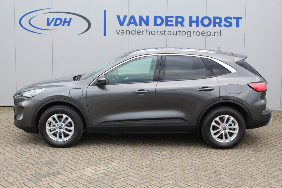Ford Kuga 2.5-225pk PHEV Titanium X Plug-In Hybrid. Fabr. garantie t/m 07-04-2028 ! Slechts 10.000km ! Autm. airco dual, stoel-, stuur- en voorraamverw., LED verl., B&O soundsyst., metallic lak, cruise control, camera, LM wielen, elektr. achterklep en best. stoel etc.