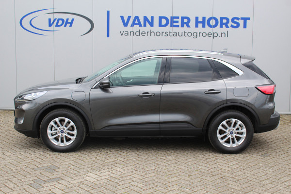 Ford Kuga 2.5-225pk PHEV Titanium X Plug-In Hybrid. Fabr. garantie t/m 07-04-2028 ! Slechts 10.000km ! Autm. airco dual, stoel-, stuur- en voorraamverw., LED verl., B&O soundsyst., metallic lak, cruise control, camera, LM wielen, elektr. achterklep en best. stoel etc.