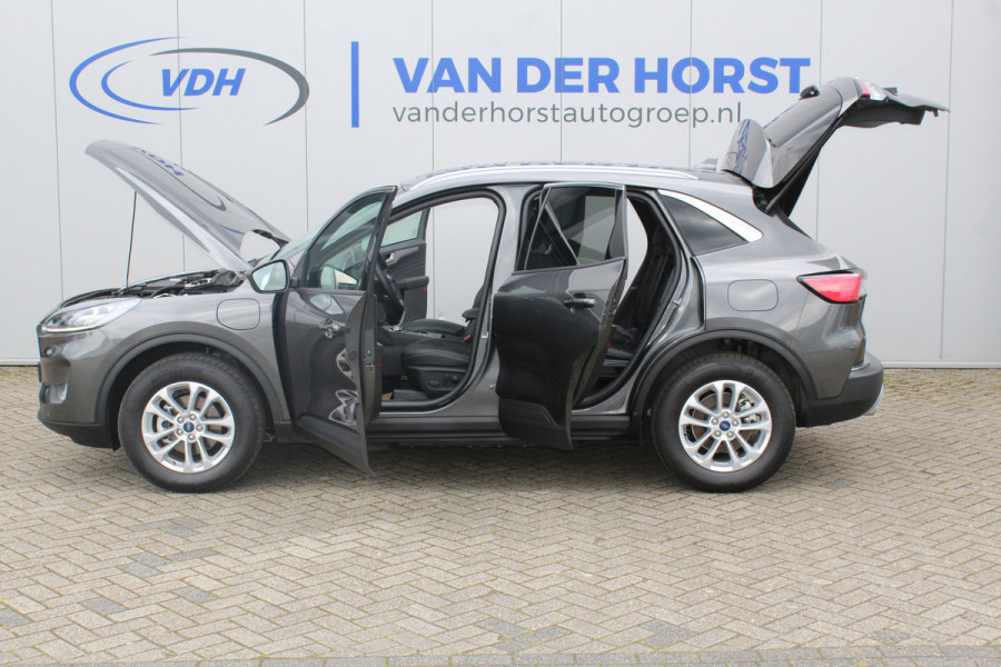 Ford Kuga 2.5-225pk PHEV Titanium X Plug-In Hybrid. Fabr. garantie t/m 07-04-2028 ! Slechts 10.000km ! Autm. airco dual, stoel-, stuur- en voorraamverw., LED verl., B&O soundsyst., metallic lak, cruise control, camera, LM wielen, elektr. achterklep en best. stoel etc.