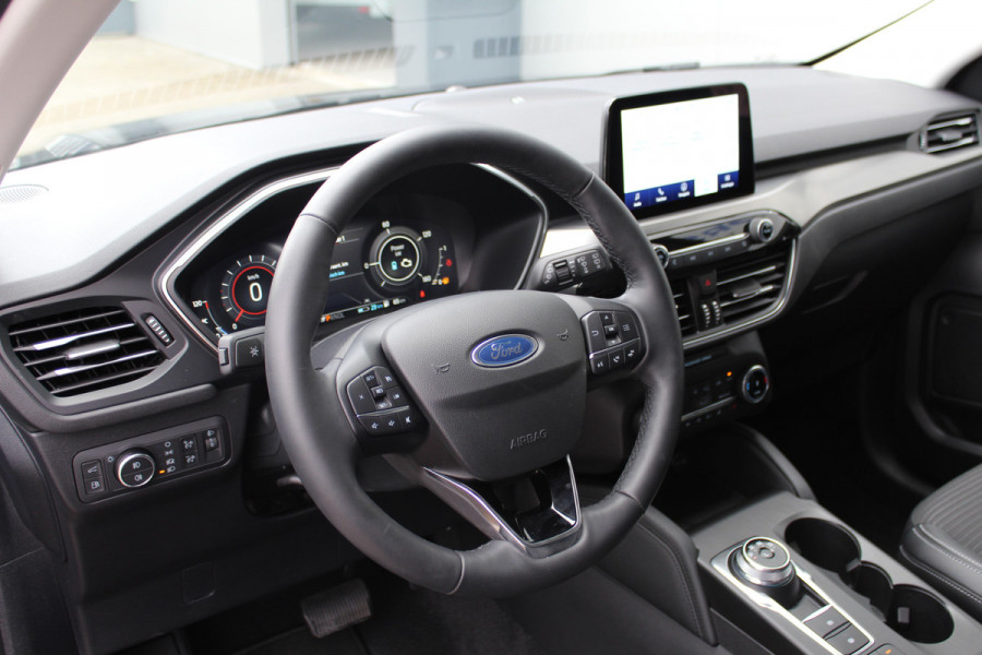 Ford Kuga 2.5-225pk PHEV Titanium X Plug-In Hybrid. Fabr. garantie t/m 07-04-2028 ! Slechts 10.000km ! Autm. airco dual, stoel-, stuur- en voorraamverw., LED verl., B&O soundsyst., metallic lak, cruise control, camera, LM wielen, elektr. achterklep en best. stoel etc.