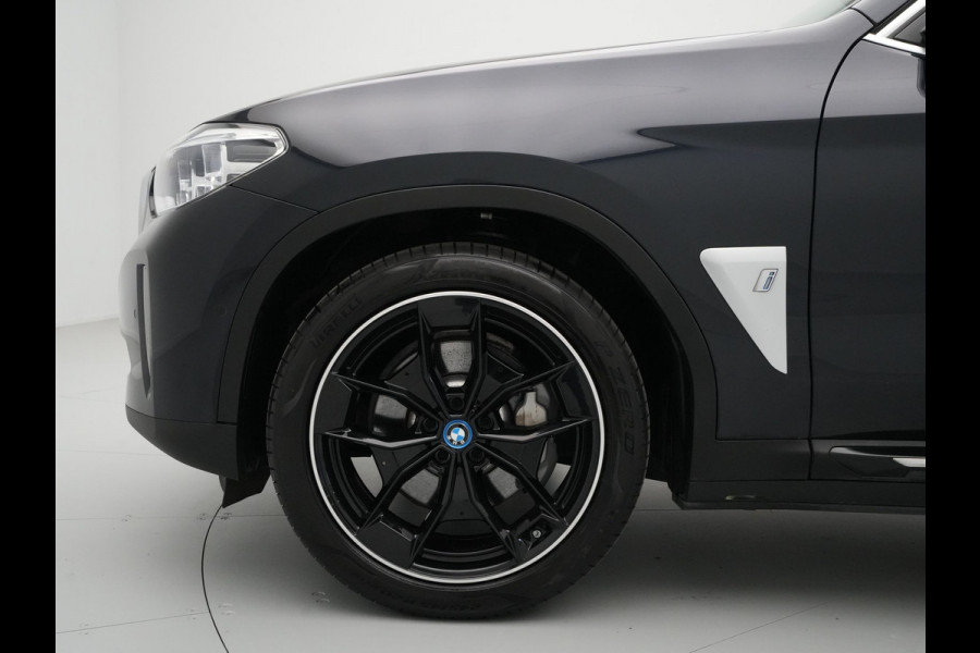 BMW iX3 High Executive 80 kWh 285pk Panorama Navigatie Trekhaak Stoelverwarming 115