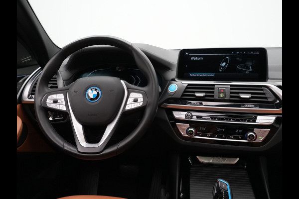 BMW iX3 High Executive 80 kWh 285pk Panorama Navigatie Trekhaak Stoelverwarming 115