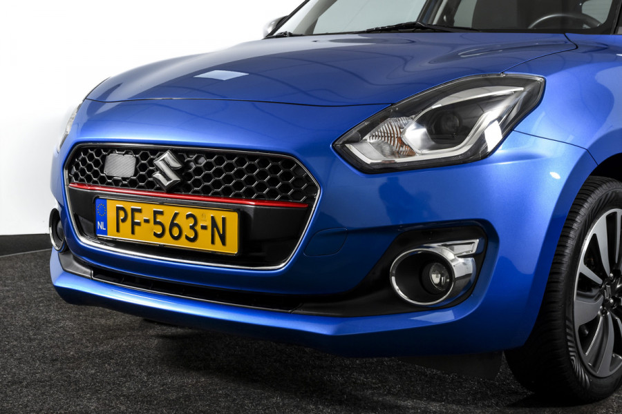 Suzuki Swift 1.0 Stijl 115 PK Smart Hybrid | Adapt. Cruise |Stoelverw. | Camera | NAV + App. Connect | ECC | Afn. Trekhaak | LM 16" |